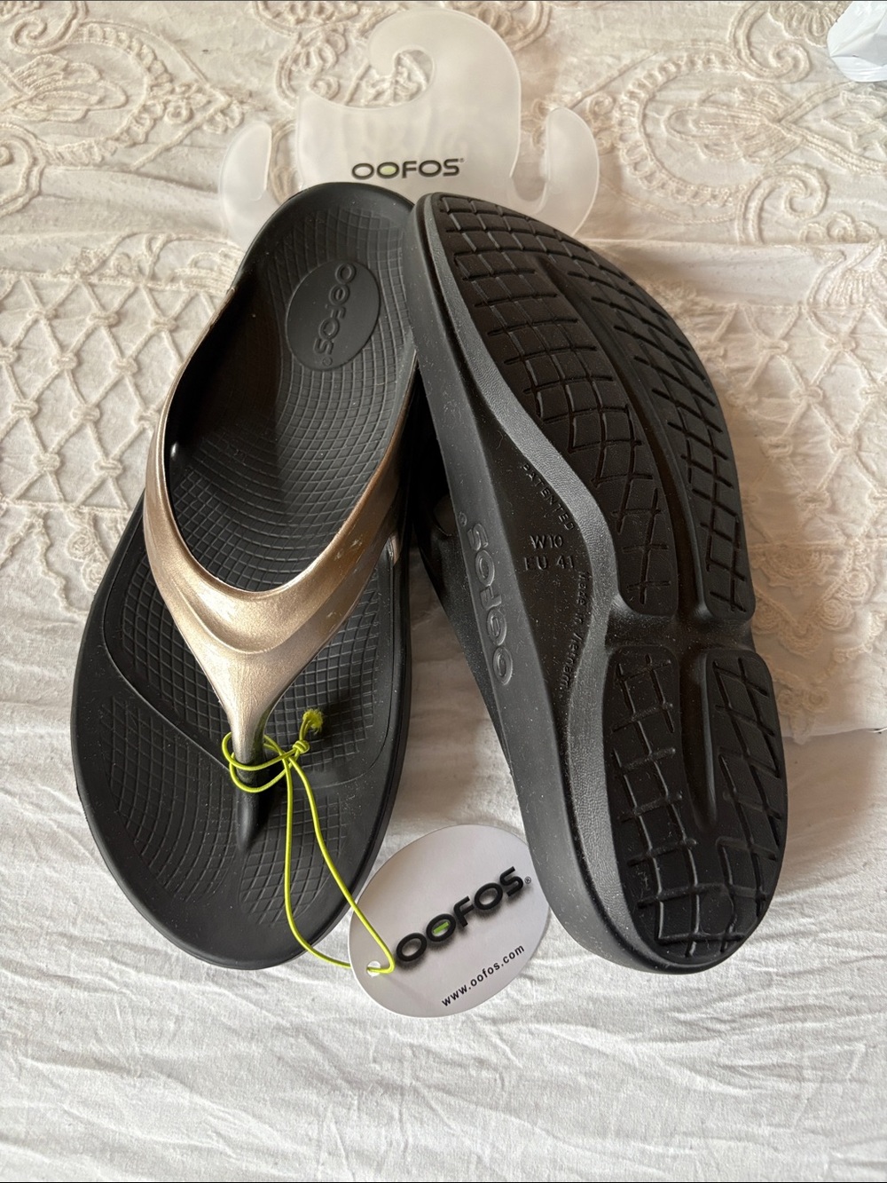 OOFOS Women’s Black Footbed with Bronze Strap Recovery Sandals